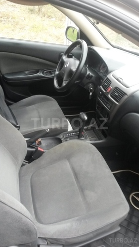 Nissan Sunny 2003, 218,100 km - 1.6 л - Bakı