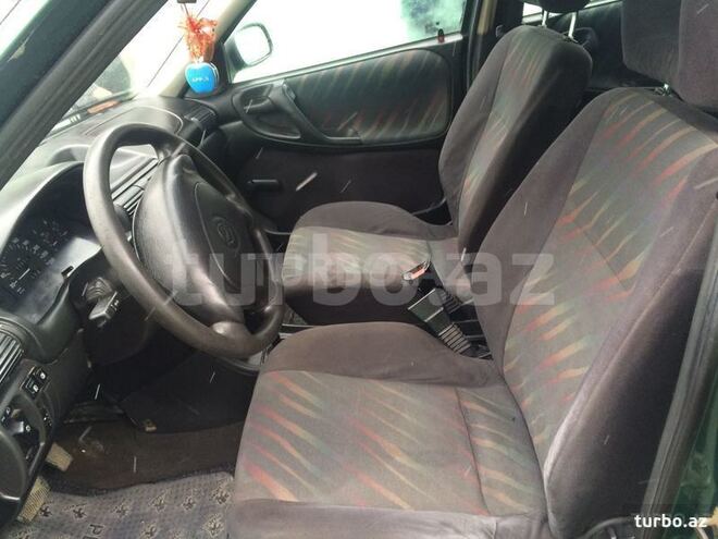 Opel Astra 1997, 312,456 km - 1.6 l - Quba