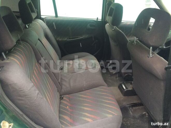 Opel Astra 1997, 312,456 km - 1.6 l - Quba