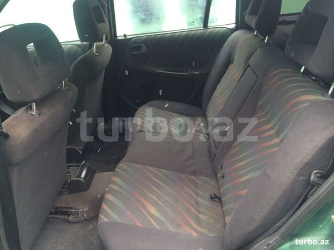 Opel Astra 1997, 312,456 km - 1.6 l - Quba