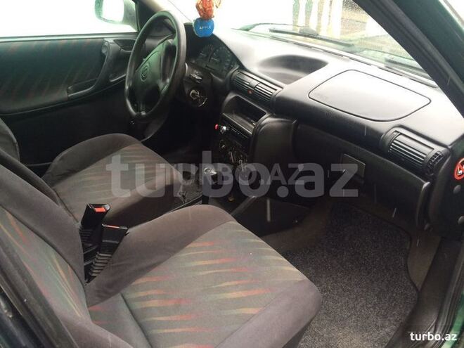 Opel Astra 1997, 312,456 km - 1.6 l - Quba