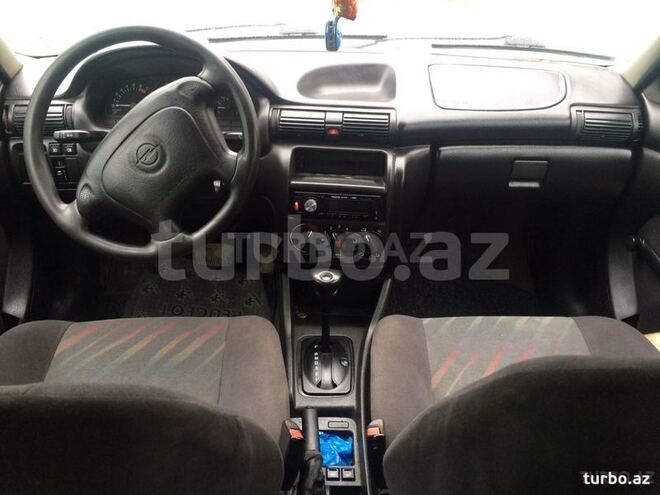 Opel Astra 1997, 312,456 km - 1.6 l - Quba