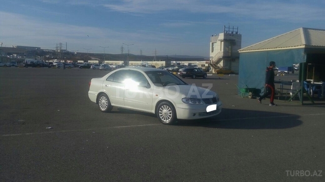 Nissan Sunny 2009, 166,000 km - 1.6 l - Bakı
