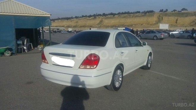 Nissan Sunny 2009, 166,000 km - 1.6 l - Bakı