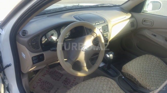 Nissan Sunny 2009, 166,000 km - 1.6 l - Bakı