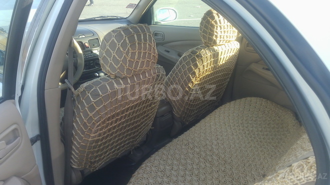 Nissan Sunny 2009, 166,000 km - 1.6 l - Bakı