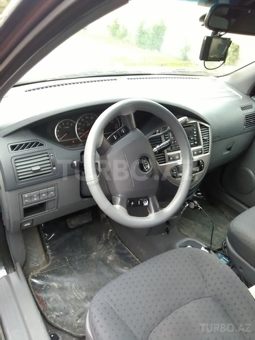 Kia Carens 2004, 174,000 km - 2.0 l - Bakı