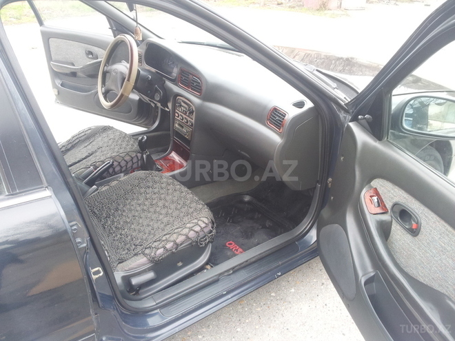Kia Clarus 1998, 200,000 km - 2.0 l - Bakı