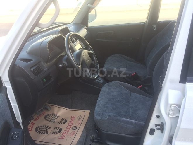 Mitsubishi Pajero io 2002, 139,715 km - 2.0 l - Bakı