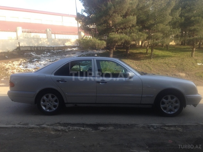 Mercedes E 230 1995, 404,156 km - 0.3 l - Bakı