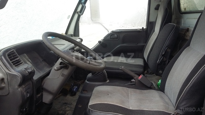 Isuzu NPR 66 L 1998, 300,000 km - 0.4 л - Quba