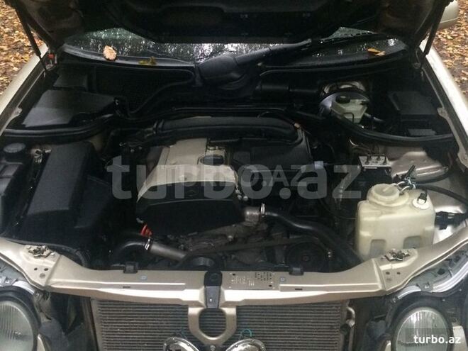 Mercedes E 230 1997, 123,456 km - 2.3 л - Quba