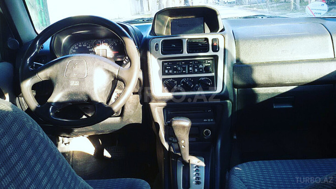 Mitsubishi Pajero io 1999, 230,000 km - 1.8 l - Sumqayıt