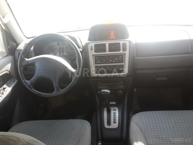 Mitsubishi Pajero io 1999, 200,000 km - 1.8 l - Sumqayıt