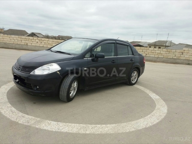 Nissan Tiida 2006, 235,000 km - 1.6 l - Salyan