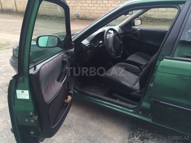 Opel Astra 1998, 310,000 km - 1.6 l - Qusar