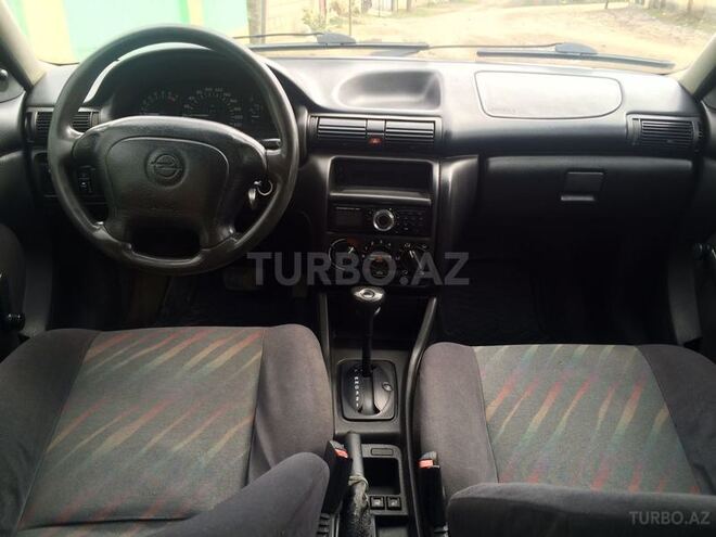 Opel Astra 1998, 310,000 km - 1.6 l - Qusar