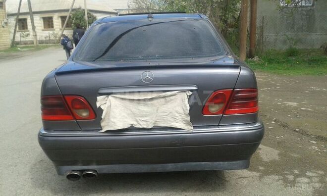 Mercedes E 220 1997, 222,542 km - 2.2 л - Gəncə