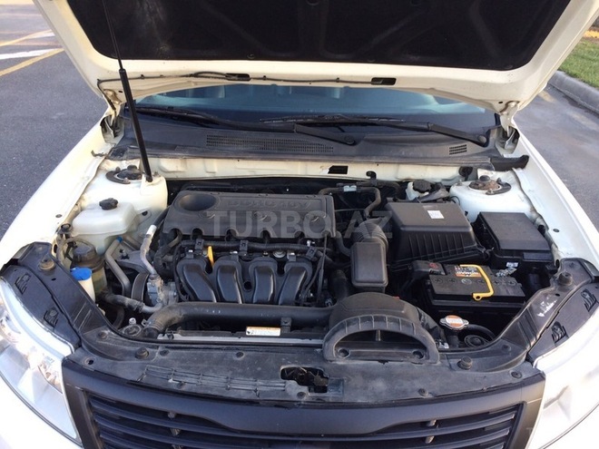 Kia Optima 2010, 120,000 km - 2.0 l - Qax