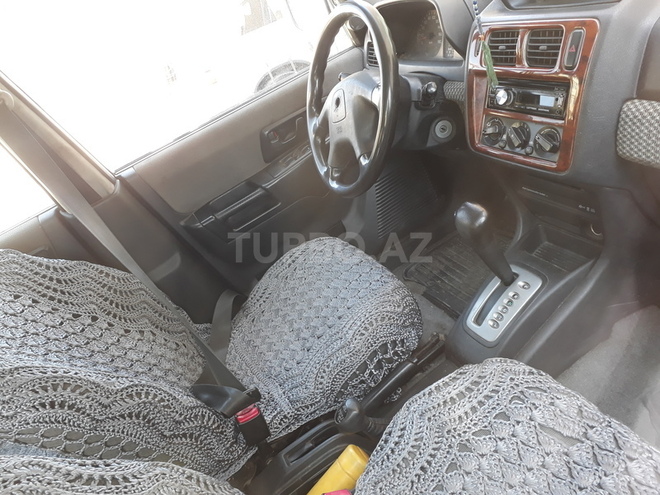 Mitsubishi Pajero io 1999, 149,000 km - 1.8 l - Bakı