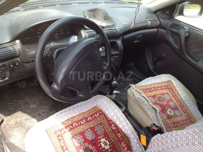 Opel Astra 1996, 300,000 km - 1.6 л - Quba