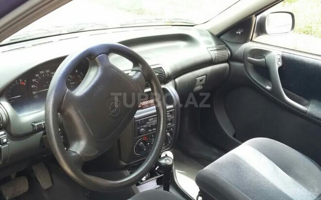 Opel Astra 1994, 30,000 km - 1.6 l - Quba