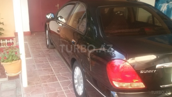 Nissan Sunny 2009, 241,658 km - 1.6 l - Bakı