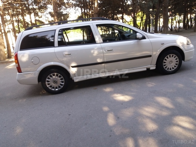 Opel Astra 1999, 1,198,110 km - 2.0 л - Bakı