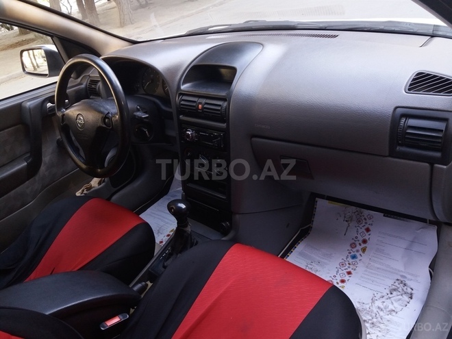 Opel Astra 1999, 1,198,110 km - 2.0 л - Bakı