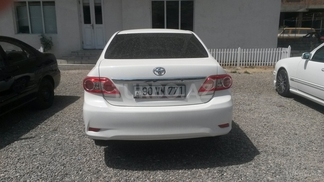 Toyota Corolla 2009, 135,800 km - 1.6 l - Bakı