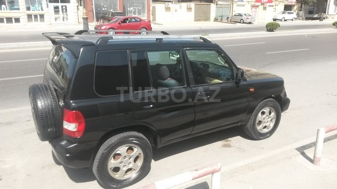 Mitsubishi Pajero io 1999, 240,000 km - 1.8 l - Bakı