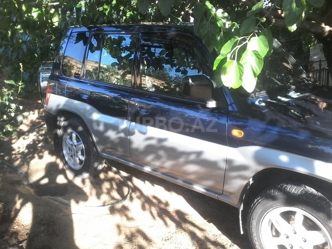 Mitsubishi Pajero io 1998, 100 km - 0.2 l - Sumqayıt