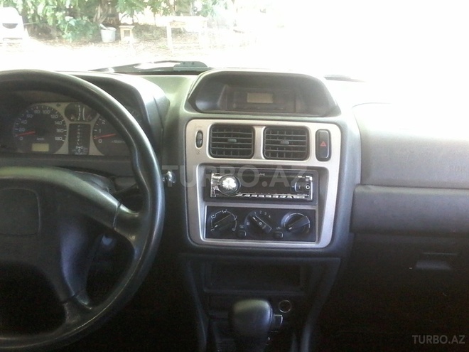 Mitsubishi Pajero io 1998, 100 km - 0.2 l - Sumqayıt