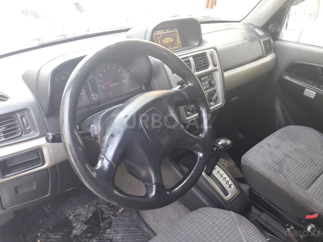 Mitsubishi Pajero io 1999, 215,000 km - 1.8 l - Yevlax