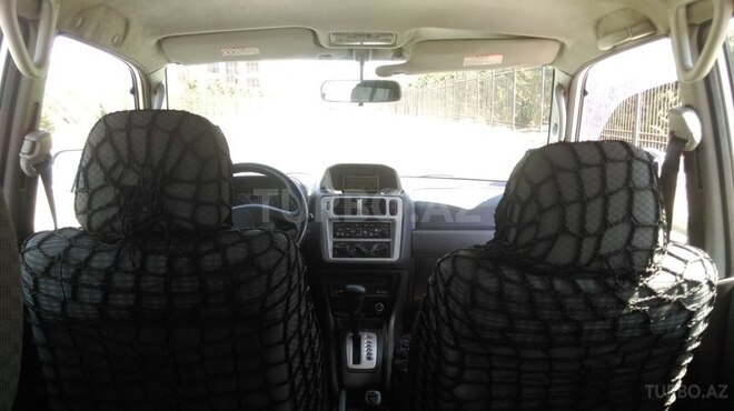 Mitsubishi Pajero io 1999, 204,000 km - 1.8 l - Bakı