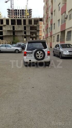 Mitsubishi Pajero io 1999, 250,000 km - 1.8 l - Bakı