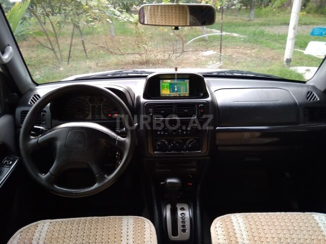 Mitsubishi Pajero io 1999, 302,084 km - 1.8 л - Ucar