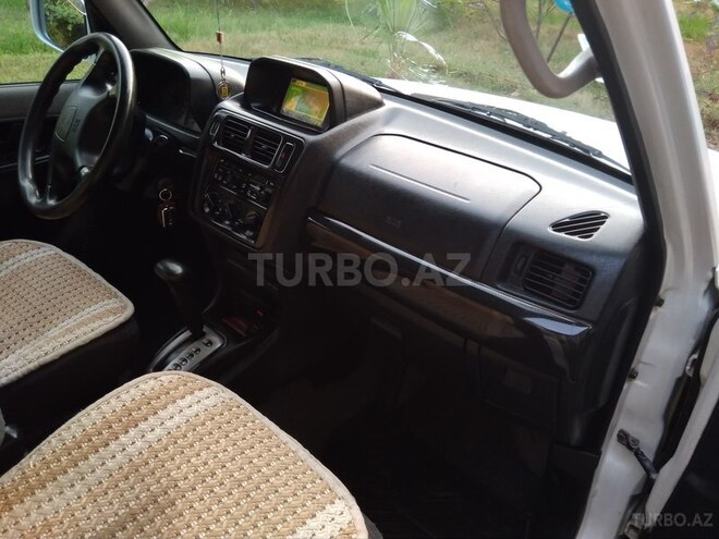 Mitsubishi Pajero io 1999, 302,084 km - 1.8 л - Ucar