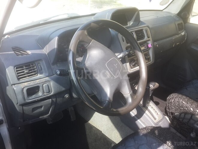 Mitsubishi Pajero io 1999, 123,456 km - 1.8 l - Sumqayıt