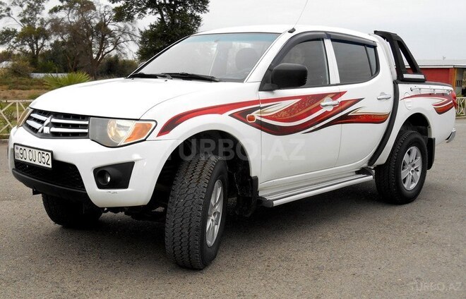 Mitsubishi L200 2008, 210,000 km - 2.5 л - Salyan