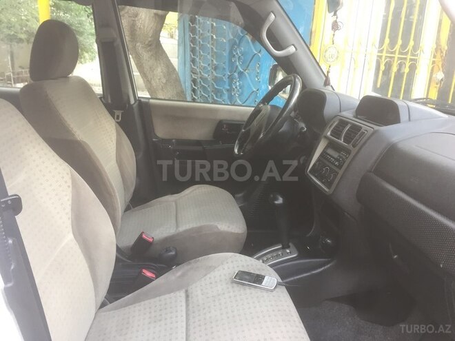 Mitsubishi Pajero io 2001, 194,000 km - 2.0 l - Bakı