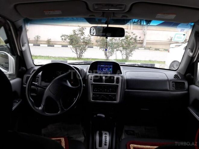 Mitsubishi Pajero io 1999, 250,150 km - 1.8 l - Bakı