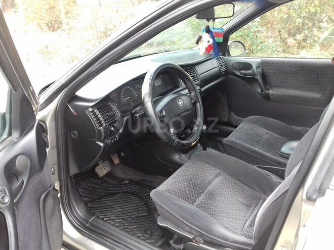 Opel Vectra 1996, 232,718 km - 1.8 л - Qax
