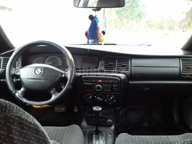 Opel Vectra 1996, 232,718 km - 1.8 л - Qax