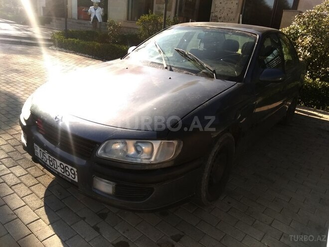 Opel Omega 1997, 220,000 km - 2.0 l - Quba