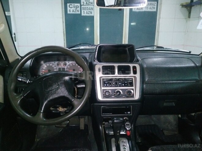 Mitsubishi Pajero io 2003, 150,000 km - 2.0 l - Bakı
