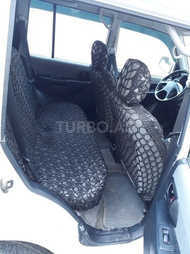 Mitsubishi Pajero io 1999, 290,000 km - 2.0 l - Bakı