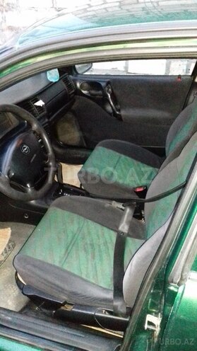 Opel Vectra 1997, 263,000 km - 2.0 l - Qusar