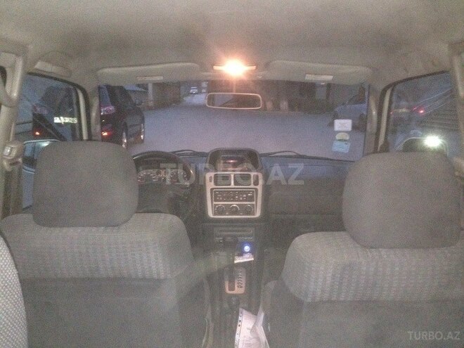 Mitsubishi Pajero io 1999, 313,000 km - 1.8 l - Bakı