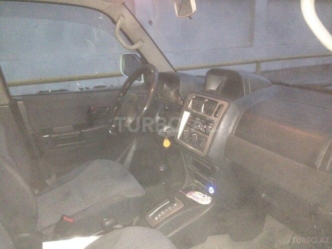 Mitsubishi Pajero io 1999, 313,000 km - 1.8 l - Bakı